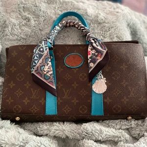 Louis Vuitton Signature Satchel